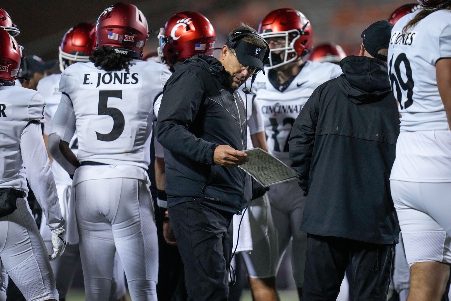 Cincinnati Bearcats head coach Scott Satterfield attempts to call a play following a touchdown in the fourth quarter of the NCAA Big12 football game between the Oklahoma State Cowboys and the Cincinnati Bearcats at Boone Pickens Stadium in Stillwater, Okla., on Saturday, Oct. 28, 2023.  